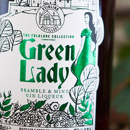 A close up of the green lady label.