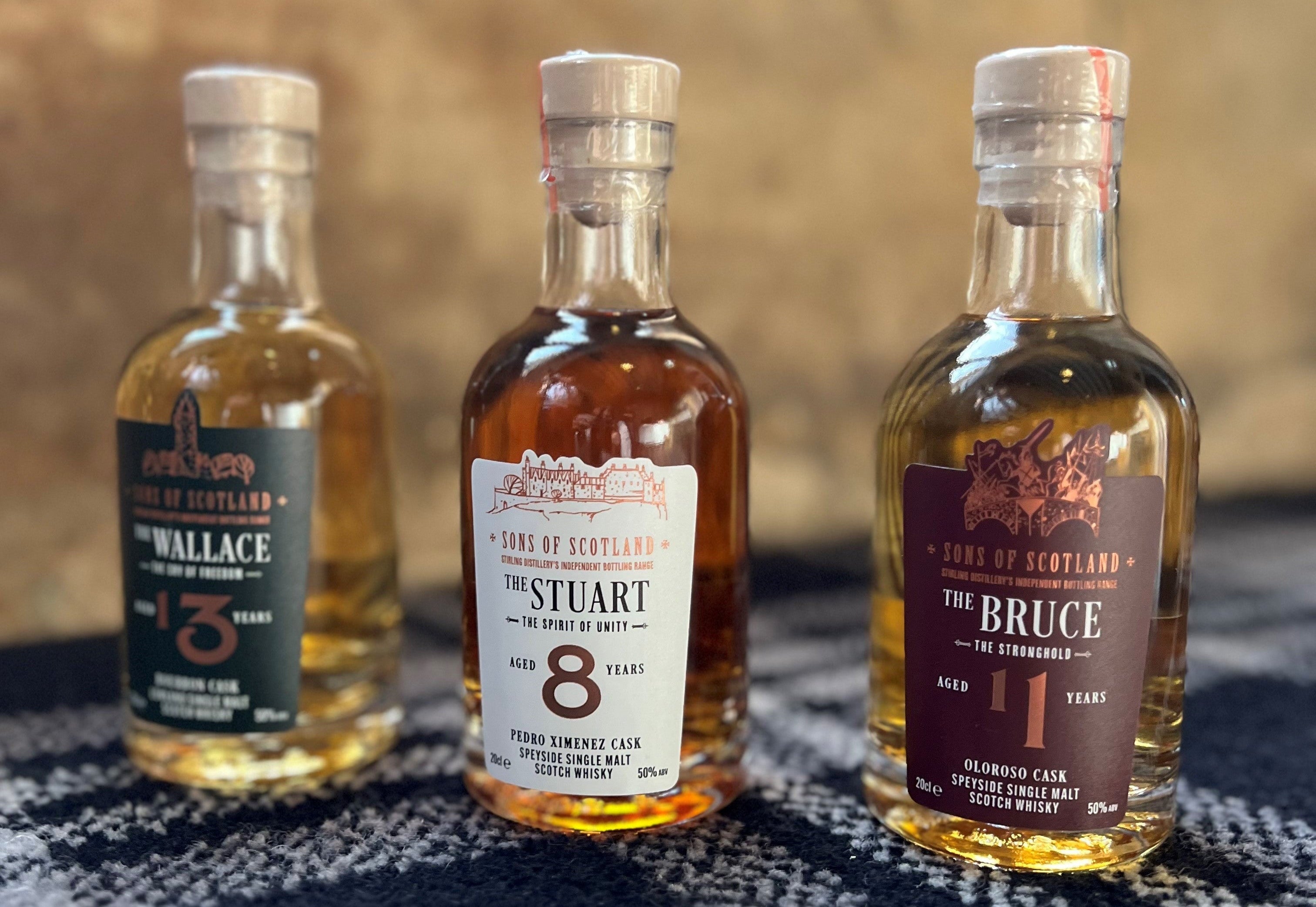 three Scottish single malt whiskies in 20ml bottles